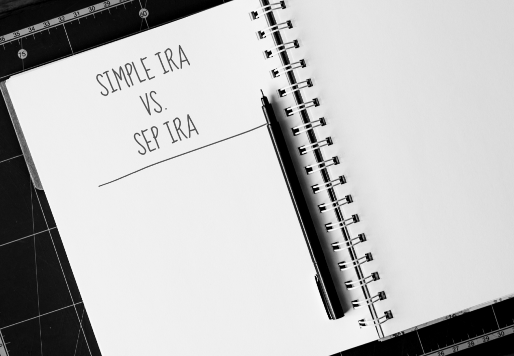 A notebook with Simple IRA vs. SEP IRA underlined